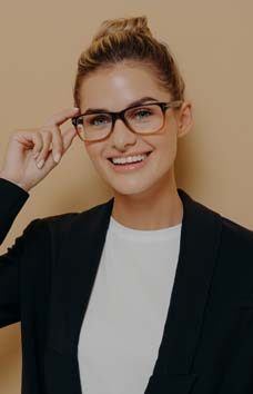 positive-happy-young-woman-touching-rim-of-glasses-2021-12-08-20-42-00-utc.jpg